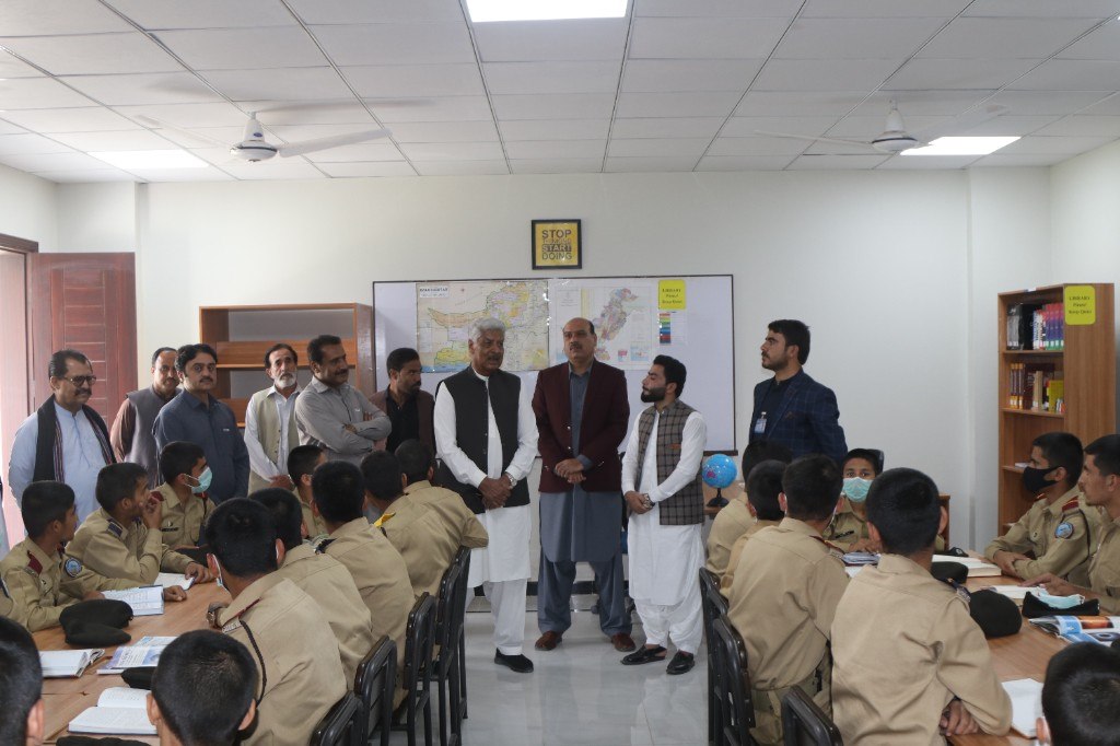Officials visiting cadets in the college library